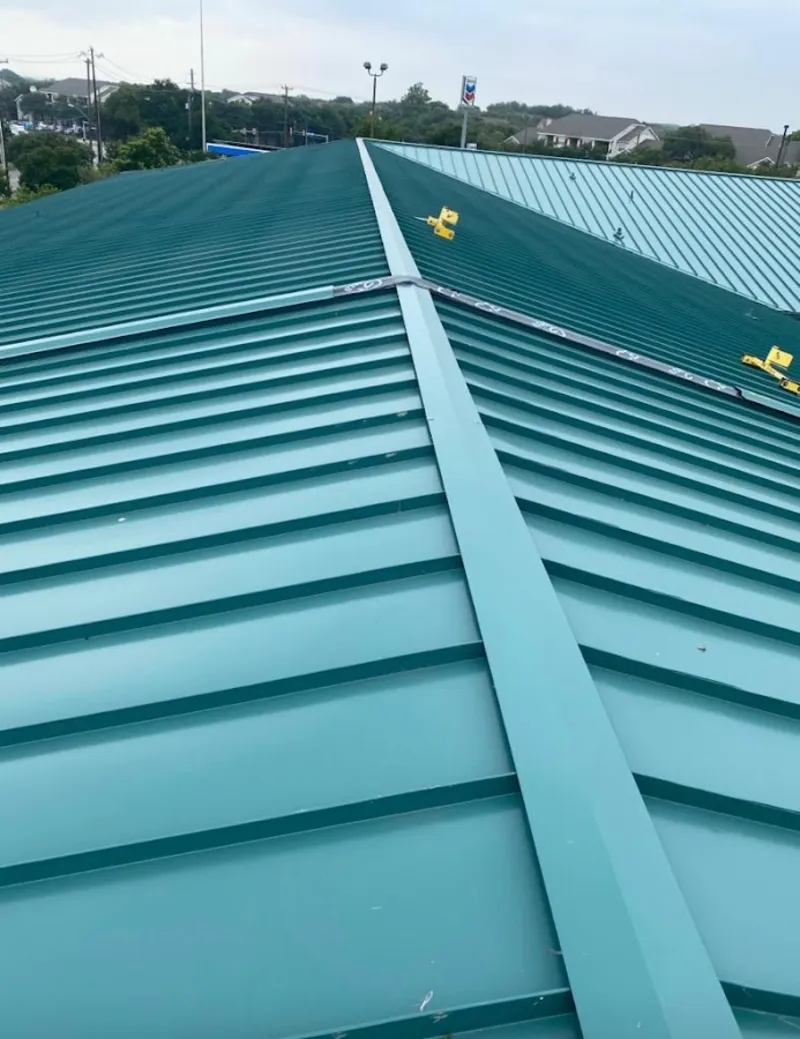 Green commercial metal roof ridge and valley for Metal Roof Repair in Woodlake